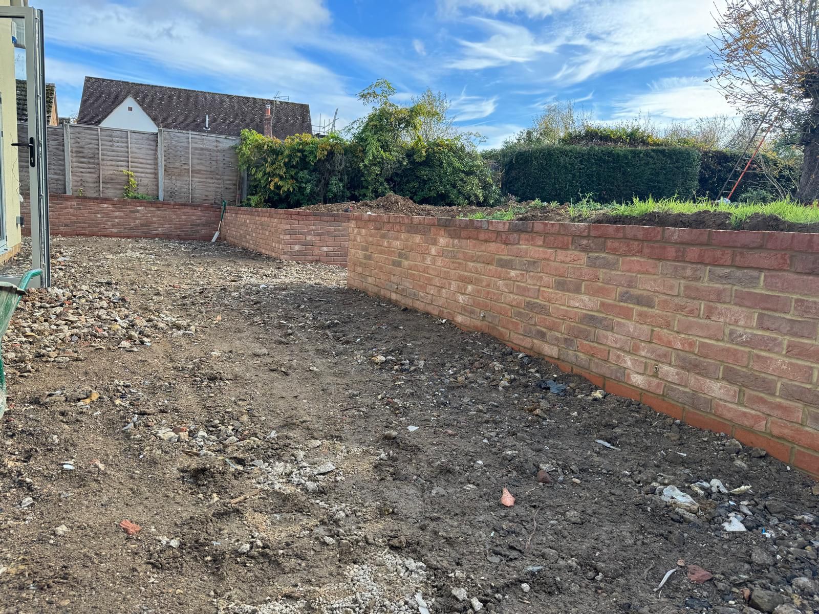 New stock-brick garden wall built by J&Co Contractors in Hertfordshire