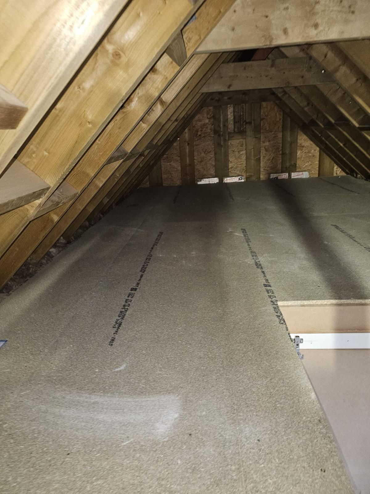 Completed loft conversion bedroom interior in Hertfordshire